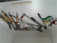 Yard and garden tools. Saws, Nippers, Sprinklers
