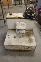 Utility fuel tank with manual pump