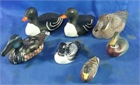7 hand carved wooden ducks various sizes