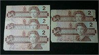 Five 1986 Canada $2 bills
