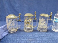 3 glass steins with pewter lids