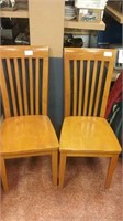 Pair of brown wooden chairs