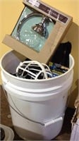 5 gallon bucket of electrical items with a new