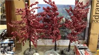 Three decorative cherry holiday trees for the