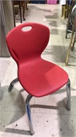 Four children's chairs red molded plastic, seat