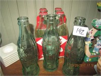 7 Coca Cola Bottles-4 (2012) & 3 Vtg. Bottles