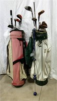 Pair Of Golfing Bags With Assorted Clubs