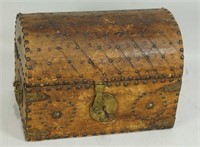 DOMED TOOLED LEATHER BOX WITH IRON STRAPS, STUDS