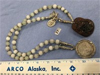 Approx. 46" jade and moonstone necklace with a pen