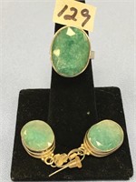 Pair of ladies pierced jade earrings and matching