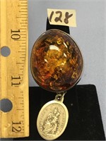 1.25" Oval piece of amber made into a ring set in