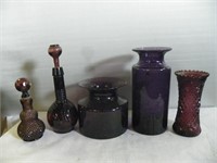 Qty of purple glass containers