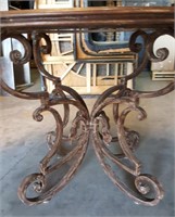 Beautiful iron sculpted table and 4 matching