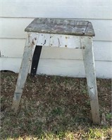 Gray metal and wood work bench. Rustic wood and
