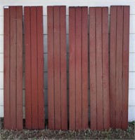 Lot of barn red and white wood shutters. Six