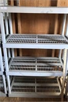 Gray plastic shelving unit