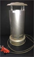 Silver colored Coleman Powermate heater