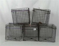 5 small holding cages