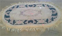 Small hand-tufted Chinese rug