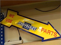 WE USE CHEVROLET PARTS SIGN