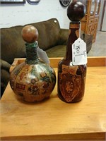 Pair of assorted decoupage bottles