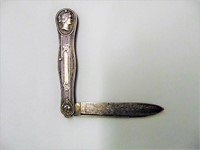 Antique Silver Knife w/embossed Face Cartouche