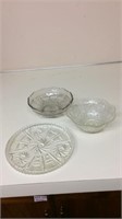 Three clear glass serving pieces