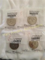 LOT OF FOUR UNCIRCULATED KENNEDY HALF