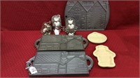 Group Including 3 Iron Gingerbread House Molds,