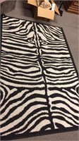 Very funky looking zebra rug, measuring