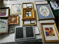 Collection of miscellaneous art prints and frames