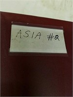 Red binder of stamps from  Asia, The Indies,