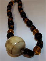Amber Beaded Necklace With Bone Pendant