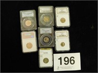 Seven US Coins in slabs: 2000 quarter NGC -