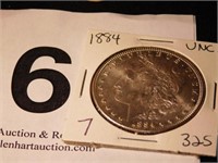1884 Morgan silver dollar, may be uncirculated
