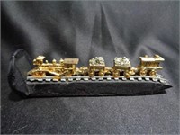 Miniature Train on a Railroad Spike