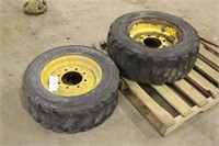 (2) 10-165. NHS Caterpillar Skid Steer Tires