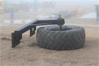 Skid Steer Tire Rotating Feed Scraper