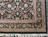 FINE SINO-PERSIAN CARPET WITH BLACK GROUND