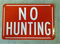 No Hunting Tin Taker Sign