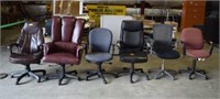 SIX OFFICE CHAIRS, ON ROLLING CASTERS
