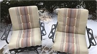 Pair of vintage patio rocking chairs with