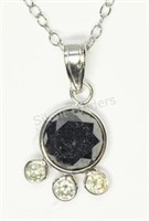 14kt White Gold Black Diamond & Three White Diamon