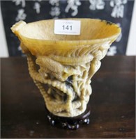 Carved horn libation cup decorated with cranes
