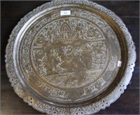 Lobed brass platter with incized decorations of