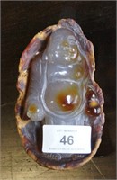 Russet & grey coloured agate pebble carved