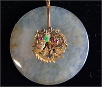 Good celadon jade bi-disc pendant with gold