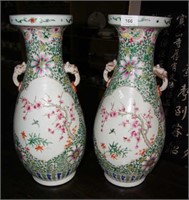 Pair of famille verte pear-shaped vases, decorated