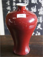 Maroon glazed meiping shaped vase with China