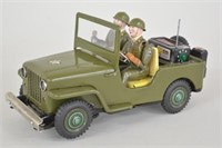 Tin Battery Op U.S. Army Bump-N-Go Radio Jeep